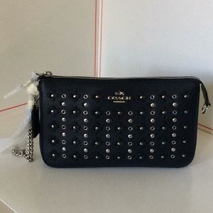 New Authentic Coach wristlet.